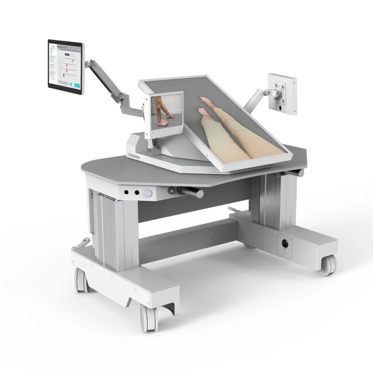 Medical hyper-realistic infant simulation mannequin on an adjustable examination table with a monitor display.