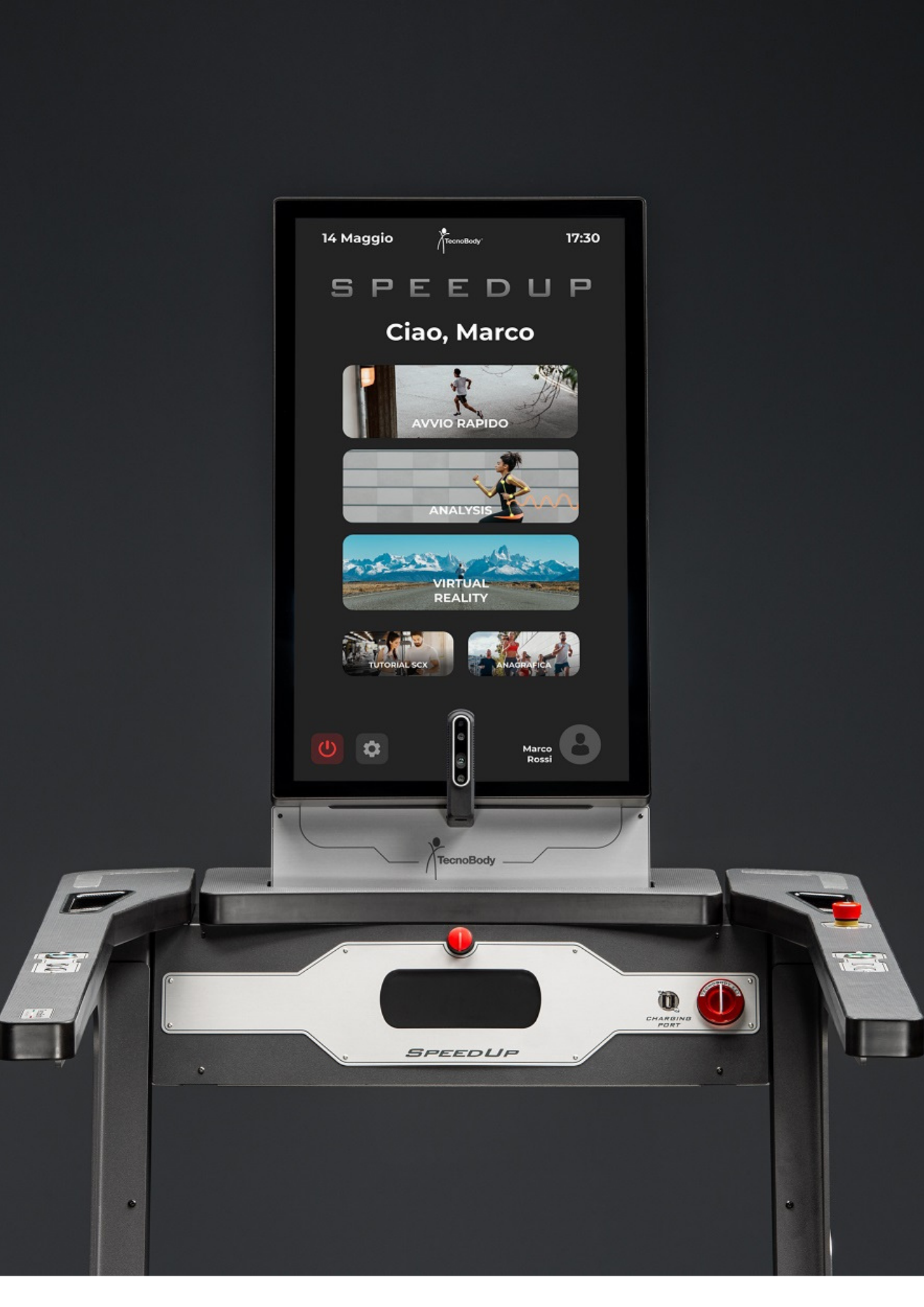 A modern treadmill with a black digital screen displaying a workout app, brand name 'SPEEDUP', and various controls on metal sides against a black background.