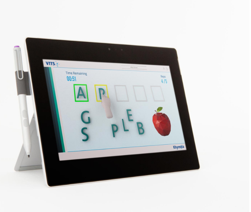 Tablet screen displaying a word puzzle game with letter tiles, a red apple graphic, and a stylus on a white background.