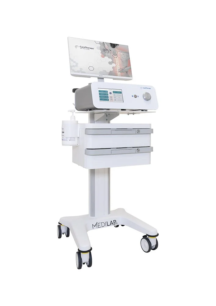 Medical device on a wheeled stand with a monitor and hand sanitizer bottle attached, labeled Medilap.