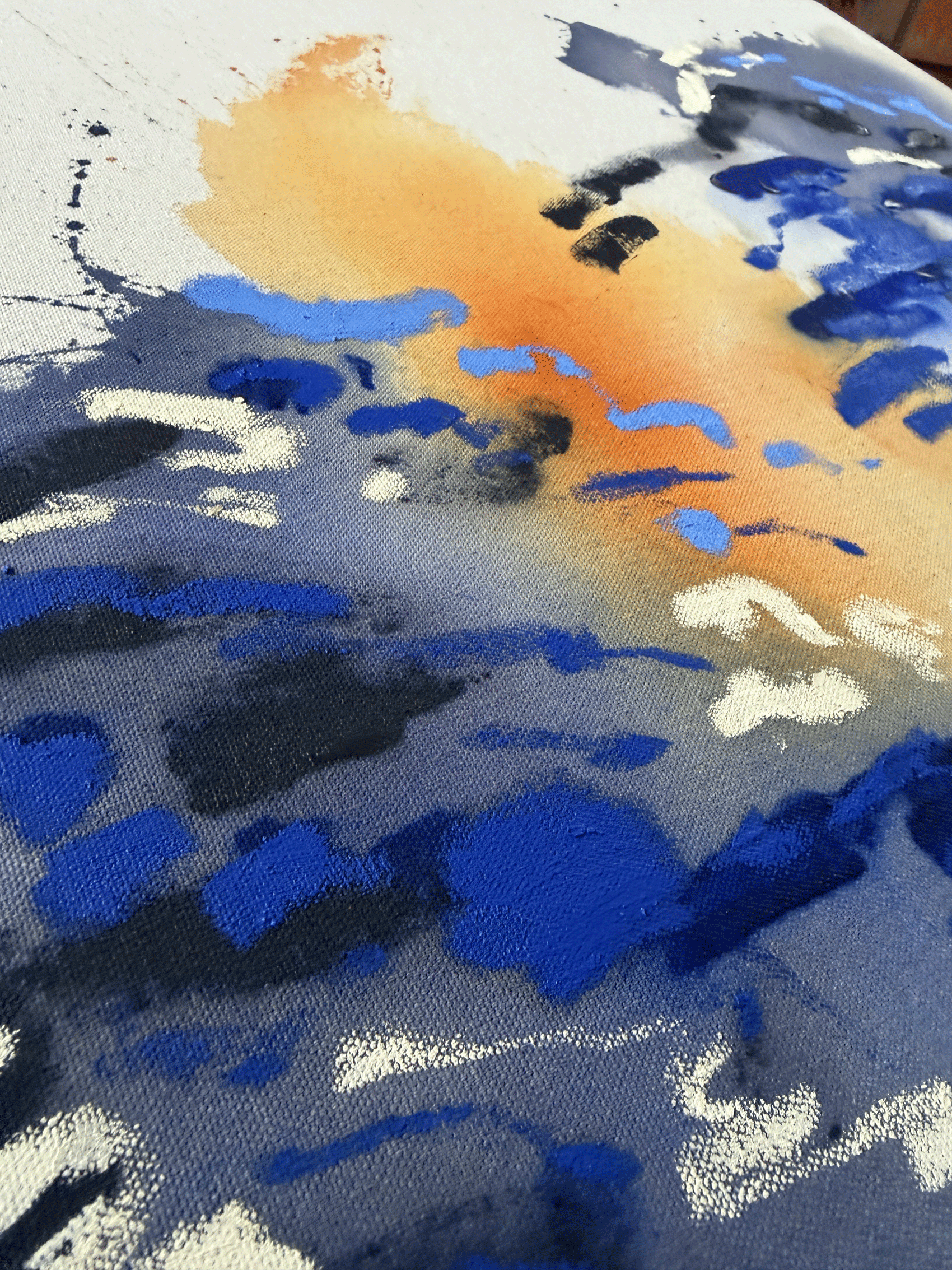 Abstract painting in cobalt, indigo and ochre with raw, stained texture on unprimed cotton duck canvas