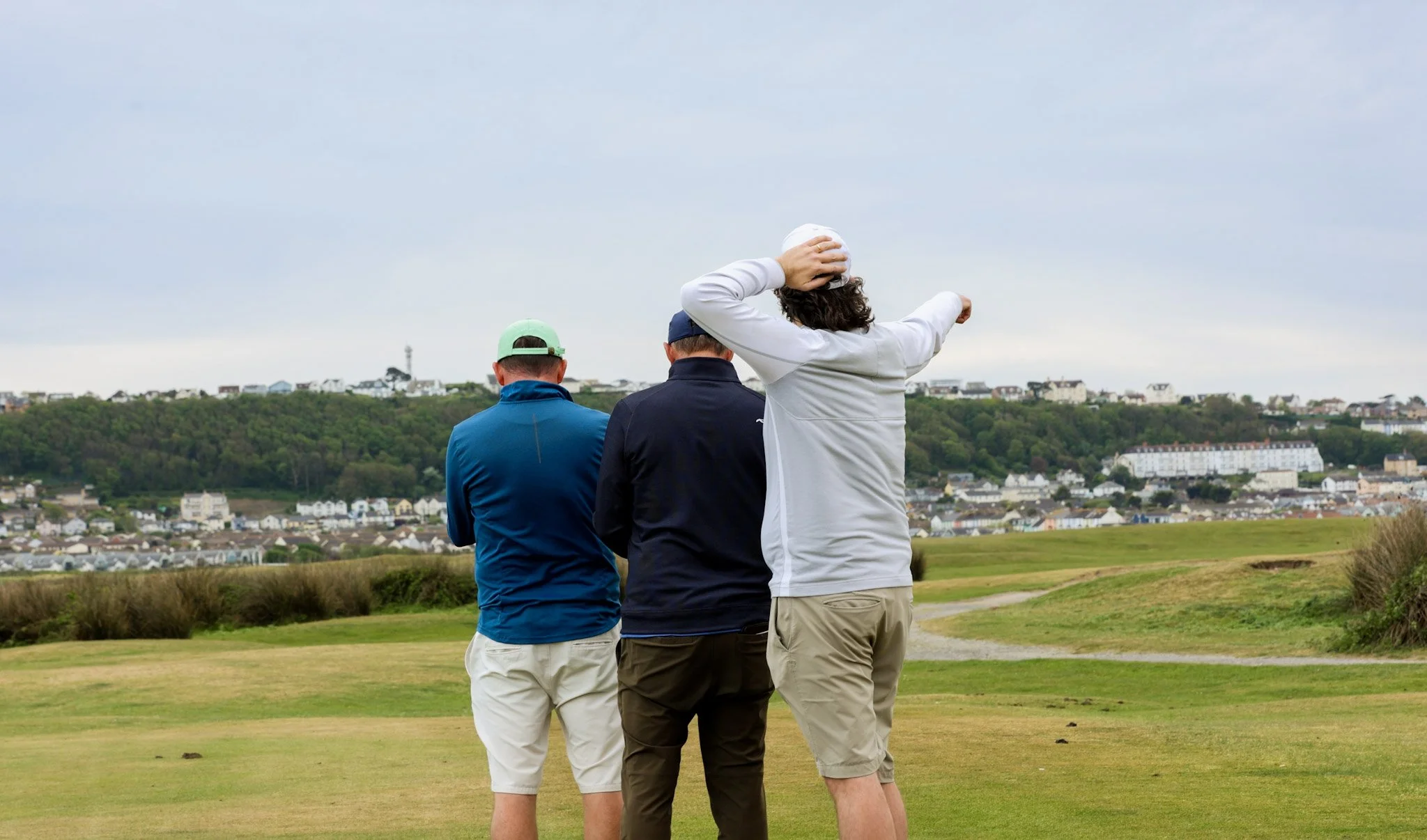 Golfers looking at skyline at Royal North Devon