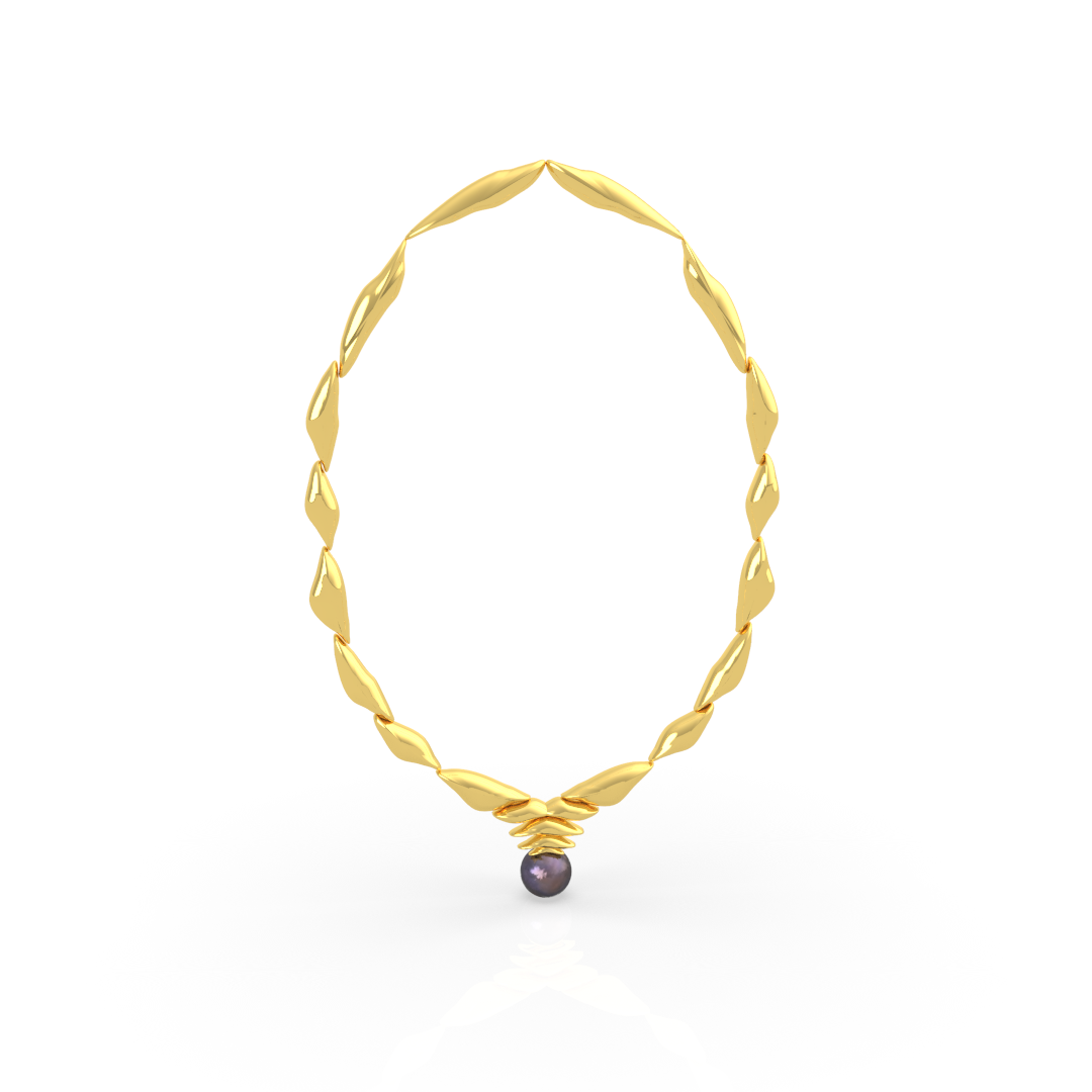 Collier en or avec une perle noire suspendue à la fin.