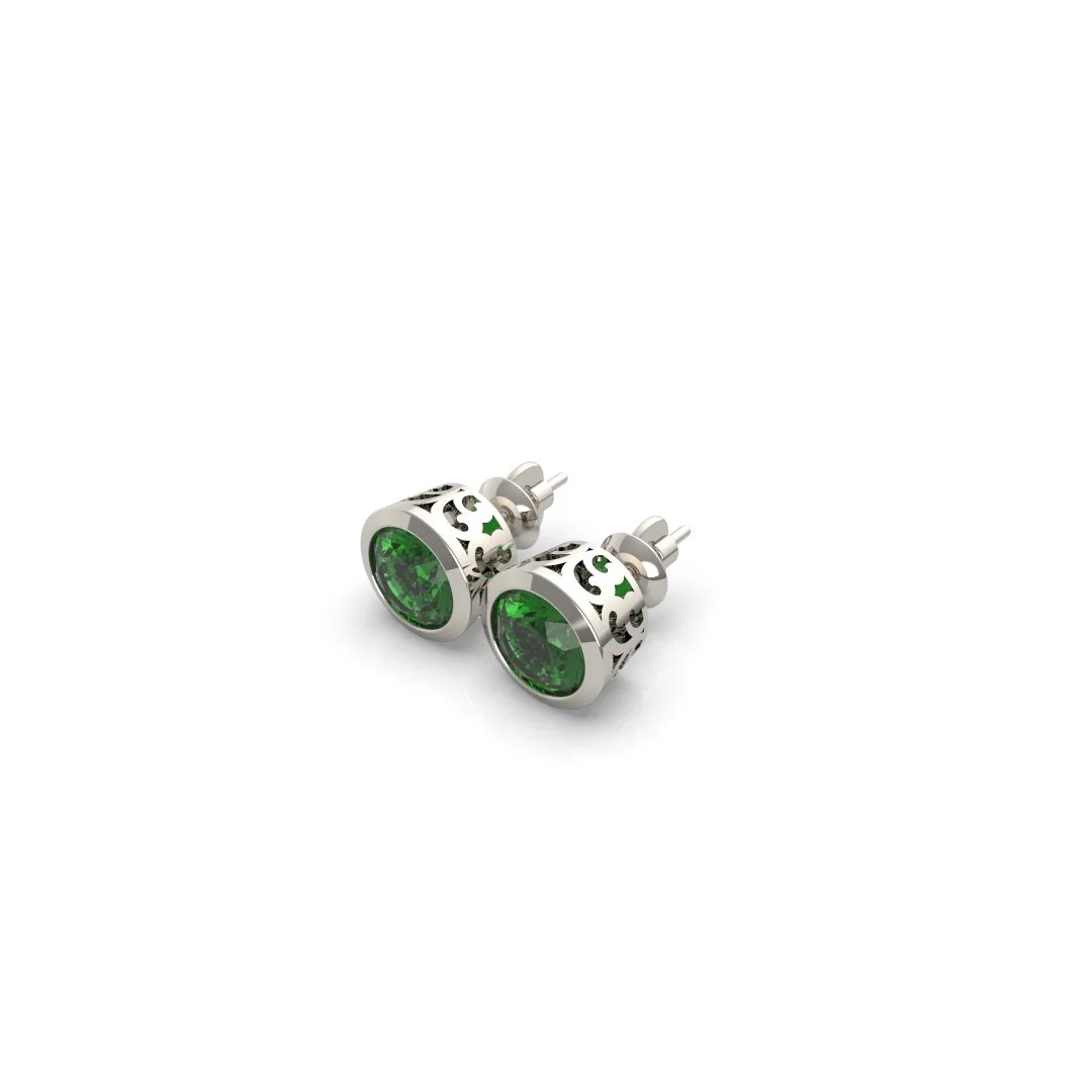 Paire de boutons de manchette en argent avec des pierres vertes incrustées, design élégant et ornementé.