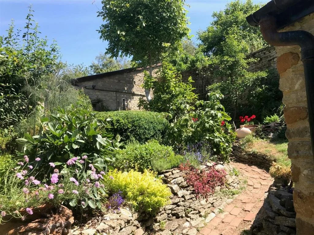 Up the garden path to the secret garden and outbuildings, Rutland.