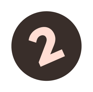 Number 2 in pink on a dark brown circle