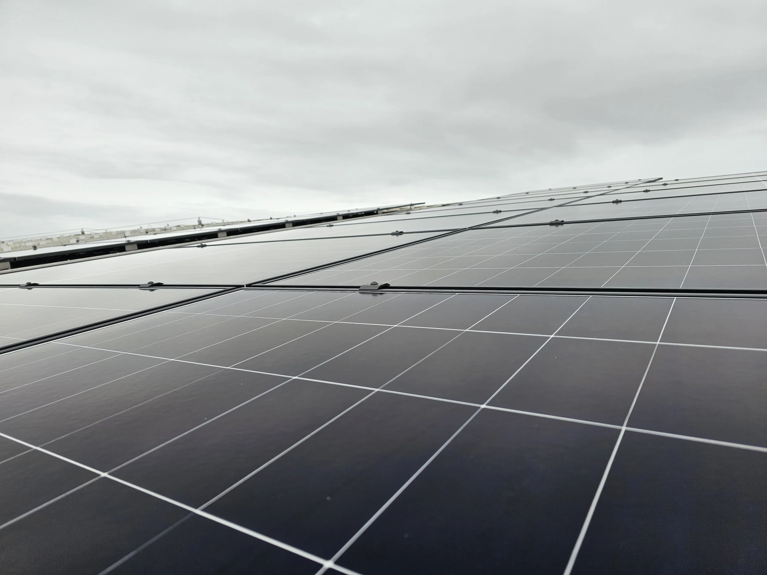 Close-up of solar panels installed on a roof in glasgow