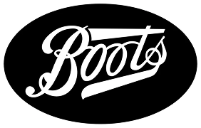 Boots logo in white on black oval background.