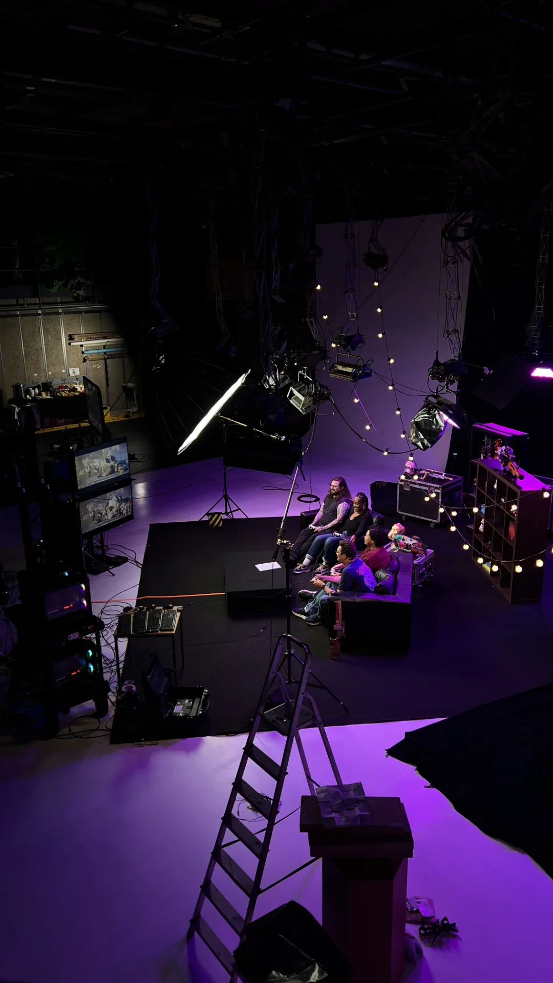 BTS shot of talent presenting and using monitors