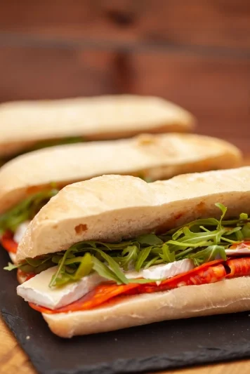 catering image with tasty sandwiches