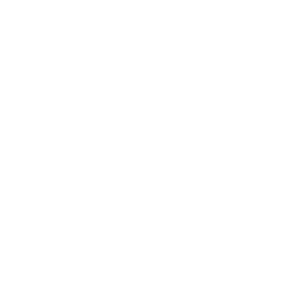 Arched decorative frame with a heart at the top, enclosing a small table with a round top and a central supporting column.