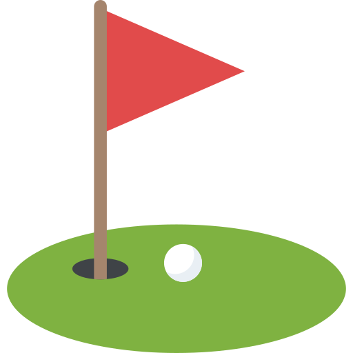 Golf flag on a green with a golf ball nearby.