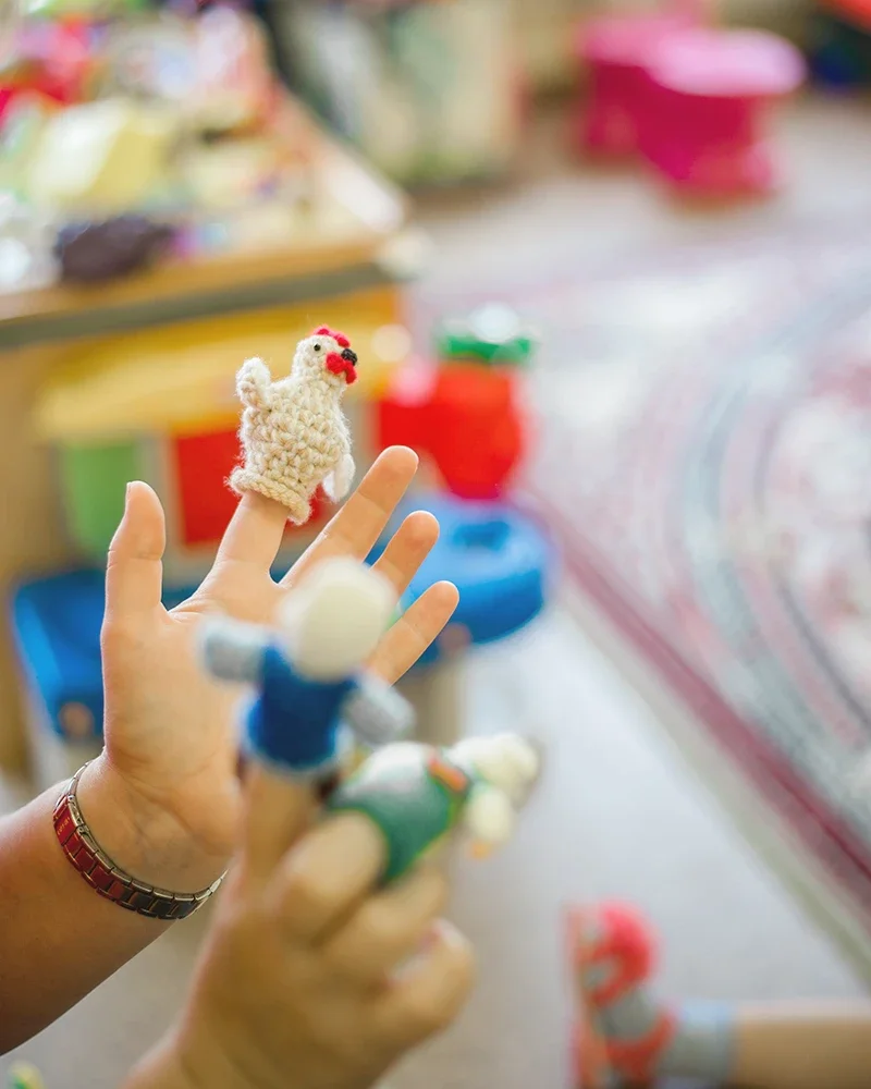 Child engaged in play therapy session to support emotional regulation and anxiety