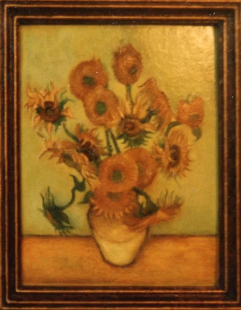 A painting of a vase with sunflowers on a table.