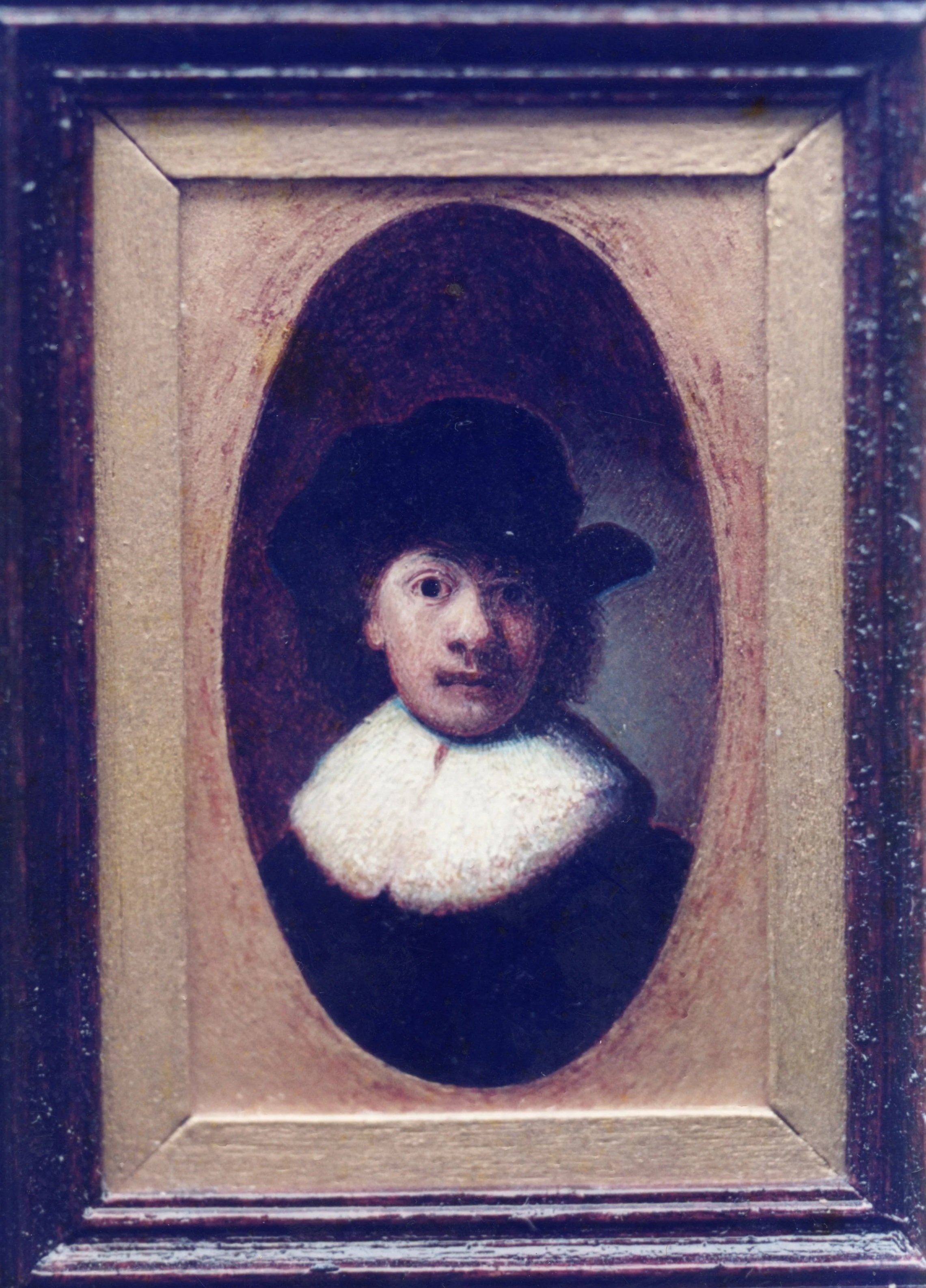 A framed painting of a woman with dark hair, wearing a white high-necked collar, with a black bow in her hair, set against a dark background.