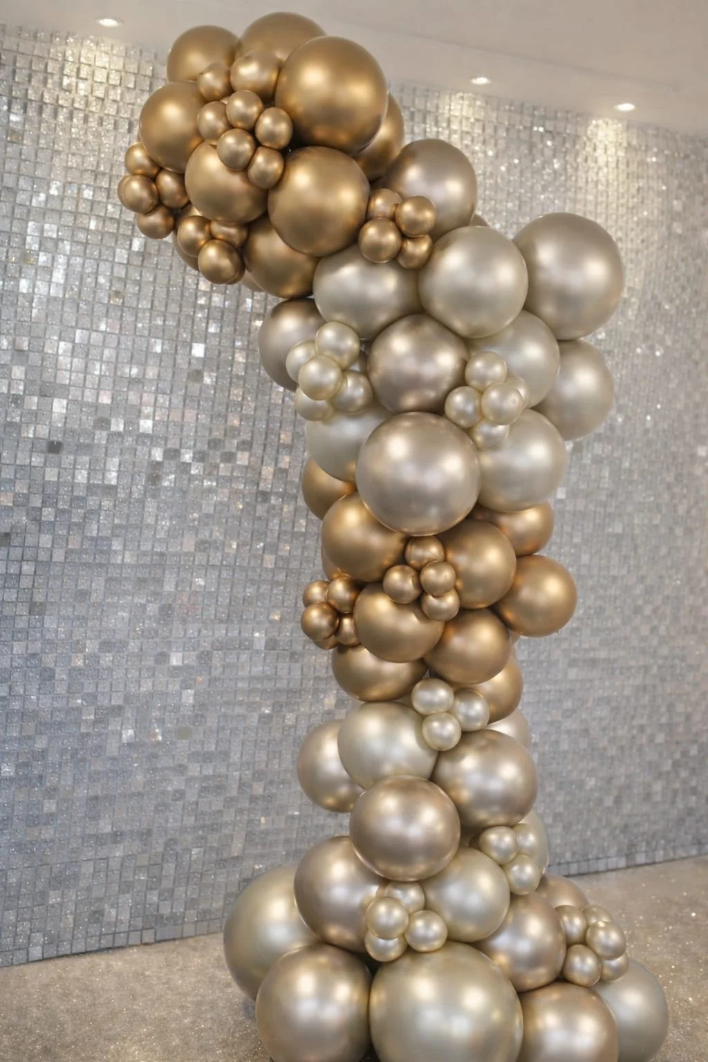 Luxury gold balloon display installation for an event celebration in Hertfordshire by B'Loonies.