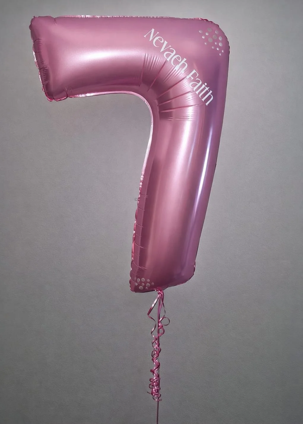 Personalised pink helium number balloon with name for a birthday celebration balloon display in Hertfordshire by B'Loonies.