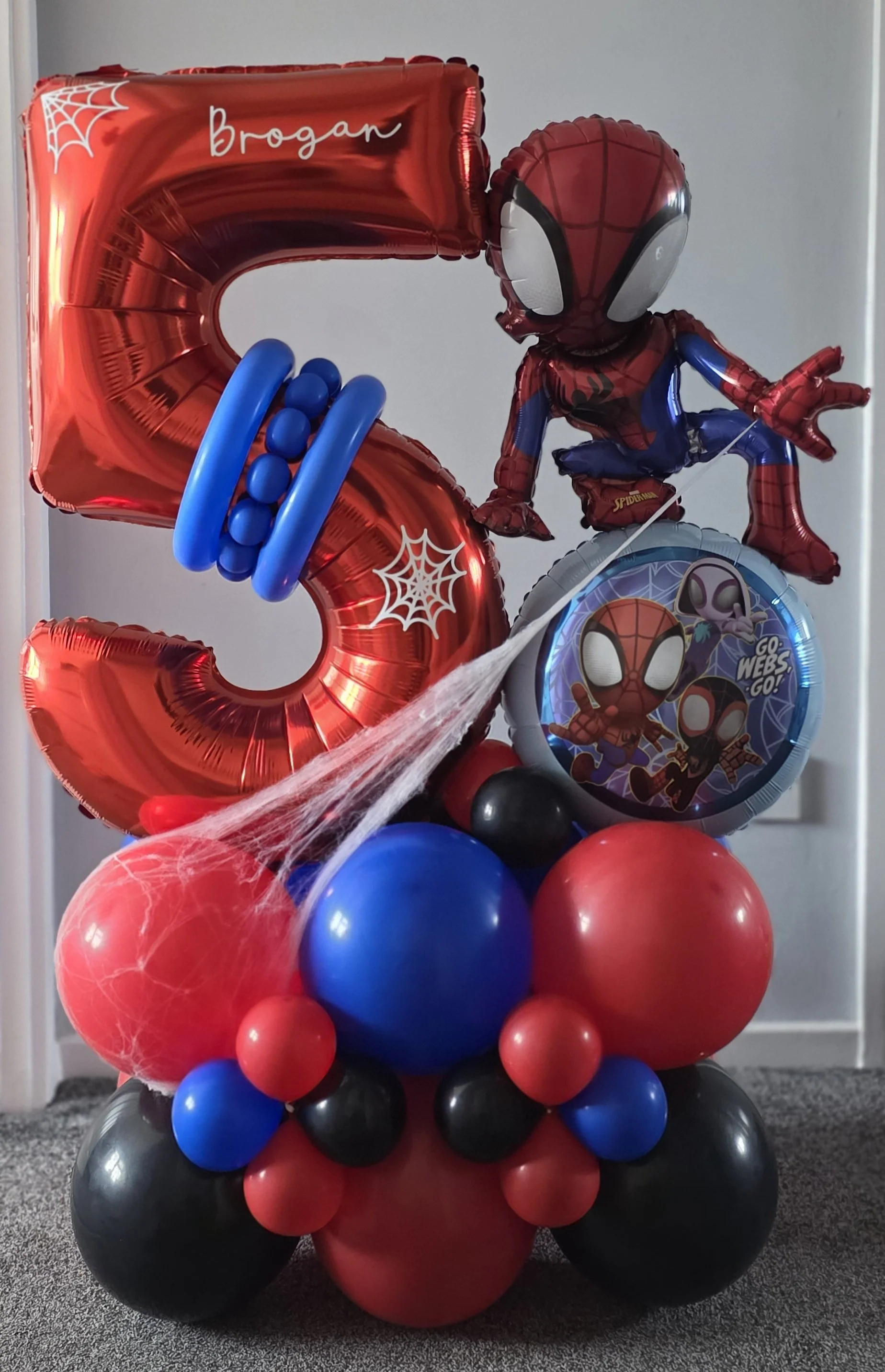 Spider-Man themed balloon display in Hertfordshire with number balloon and character styling, perfect for children’s birthday parties