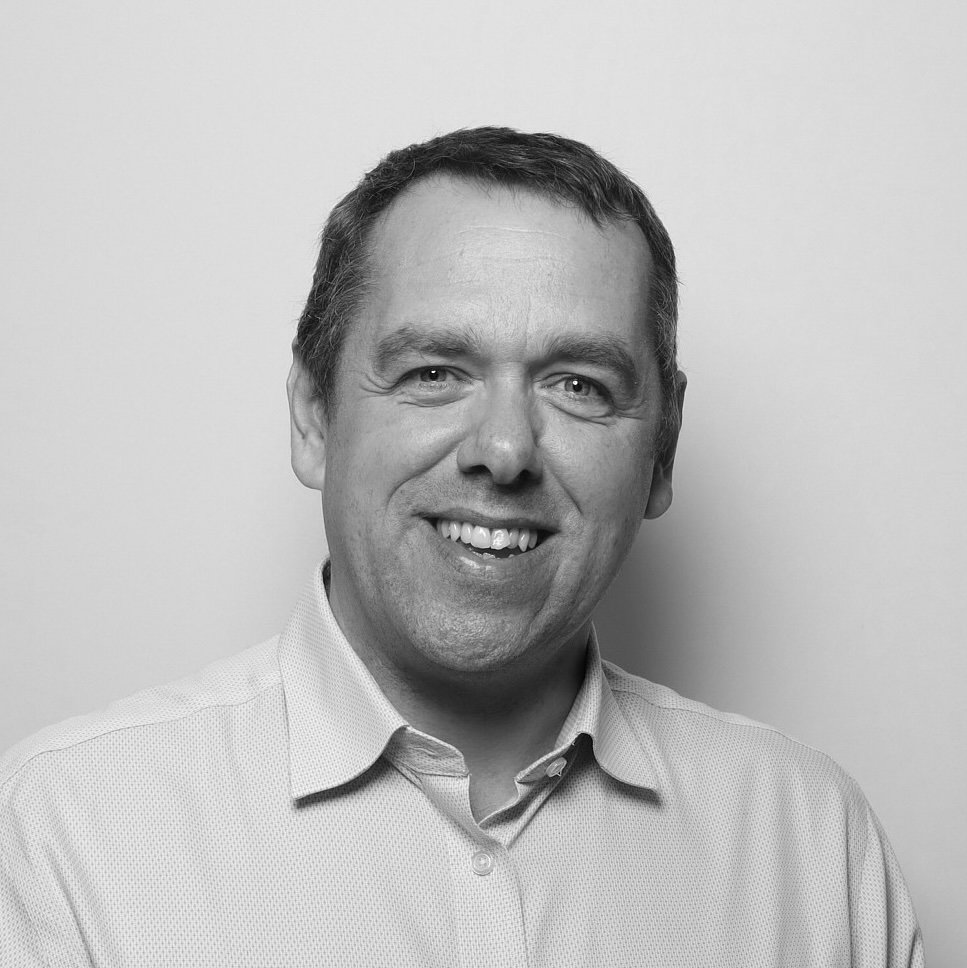 A black-and-white portrait of James Parkin, founding partner of Thorium Capital