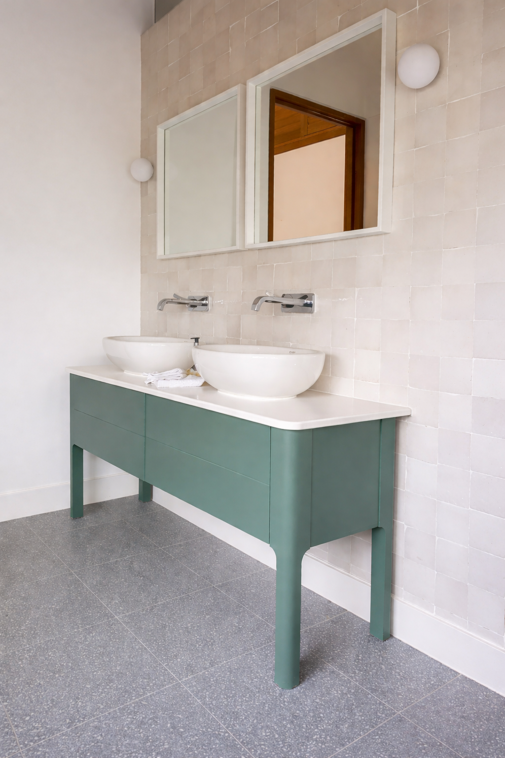 Double bathroom vanity with open shelf and underlighting