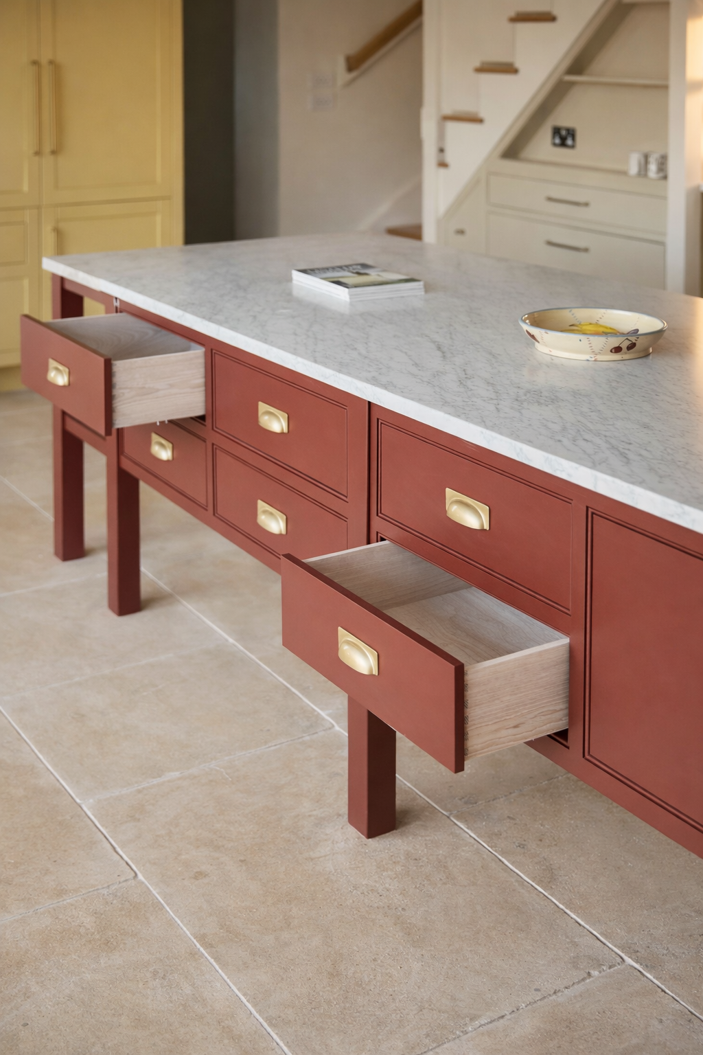 Open drawers in painted kitchen island