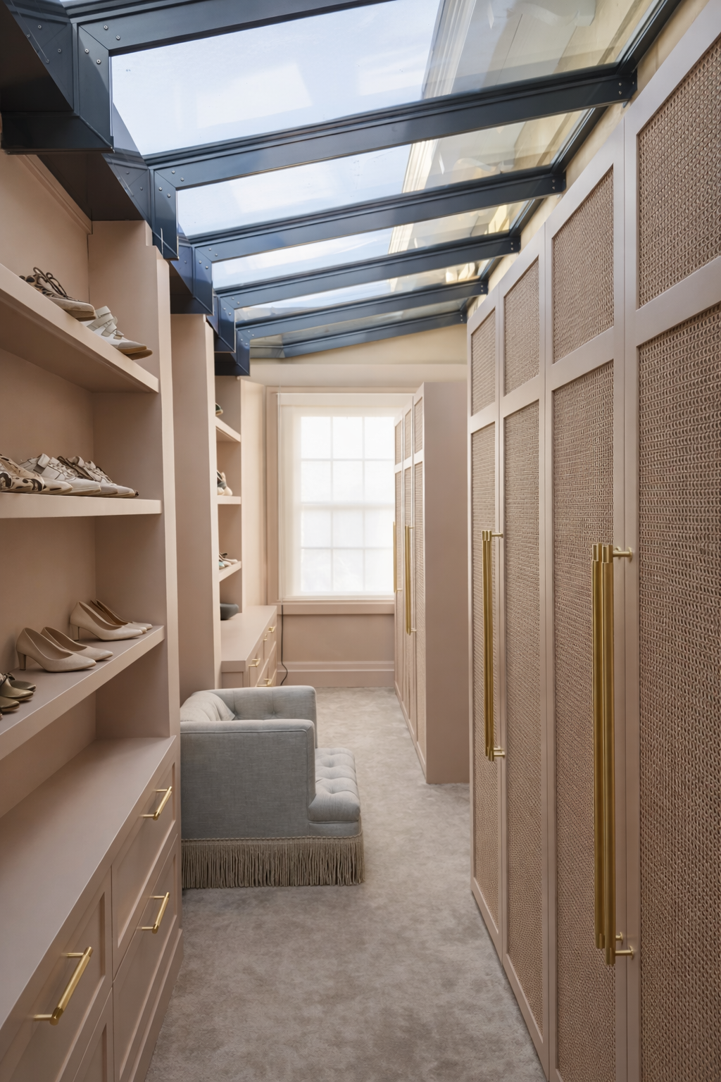Dressing room with woven wardrobe panels and rooflight above