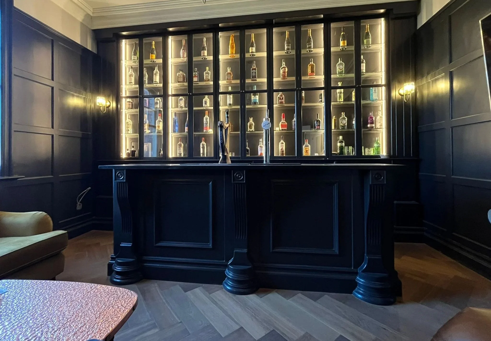 Handcrafted bar and back bar cabinetry with bespoke shelving and lighting in Sunderland Tyne and Wear.