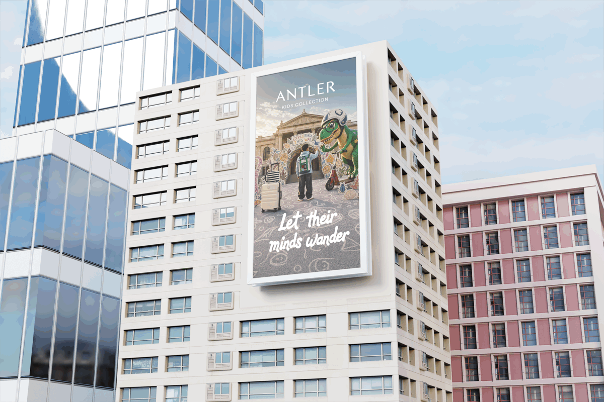 Antler Kids Collection billboard on a city building showing a child exploring with a cartoon dinosaur and the message "Let their minds wander."