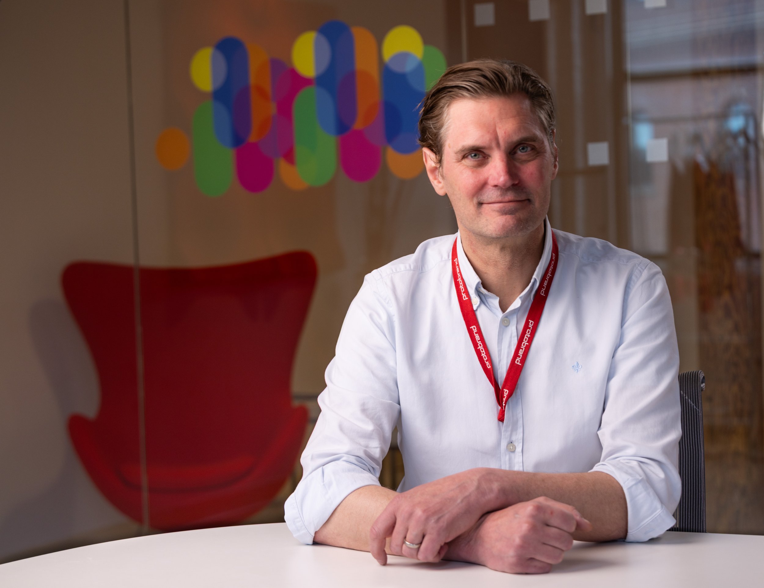 A CEO in formal attire posing for a high quality corporate headshot