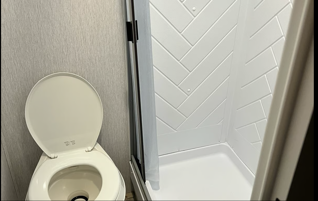 Toilet and Shower combo.