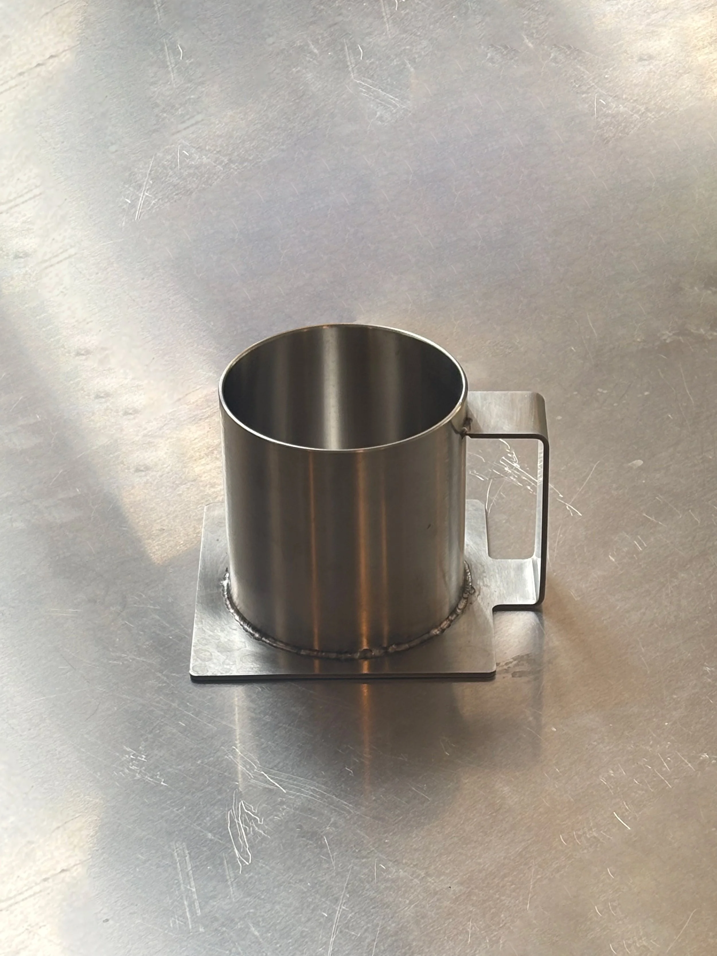 Steel cup by Studio Yann Gandon