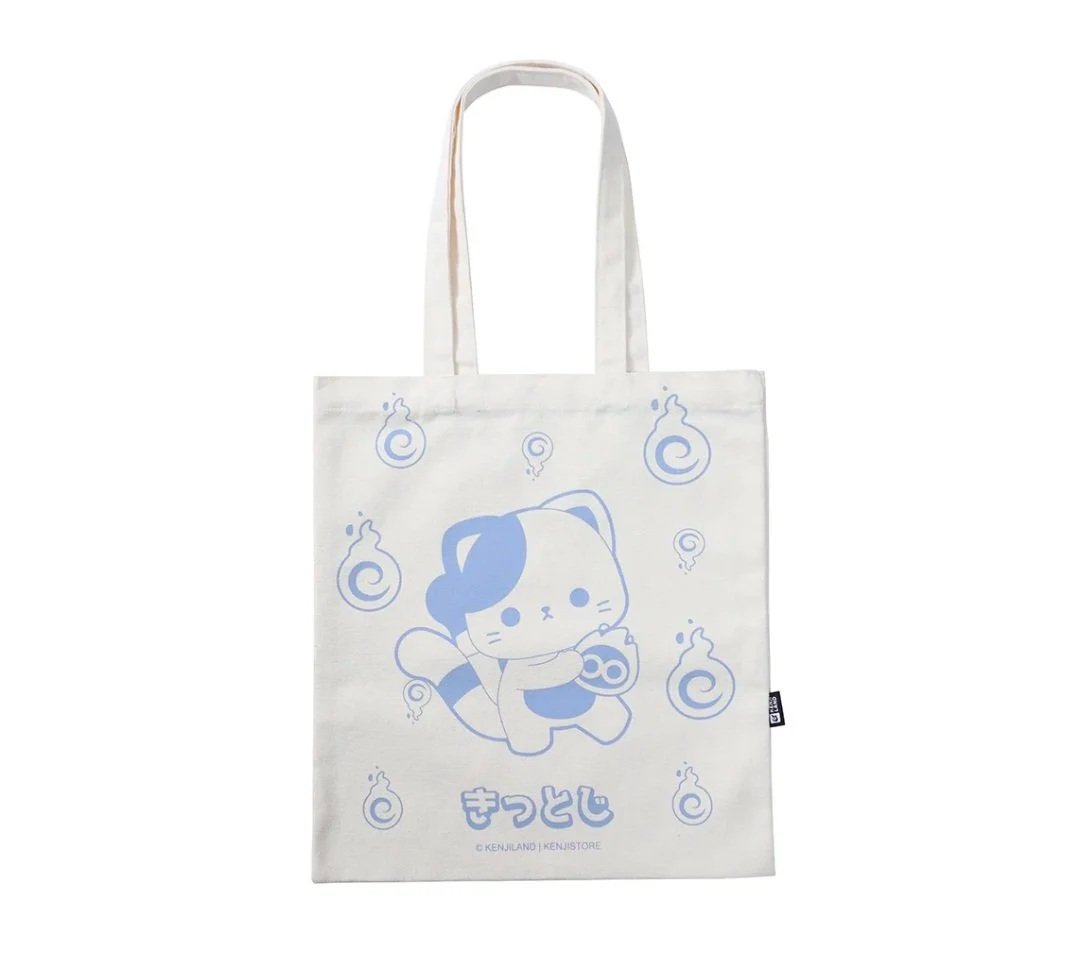 White tote bag featuring a blue illustration of a cute cat character holding a device, surrounded by smaller swirl designs, with Japanese text below the character.