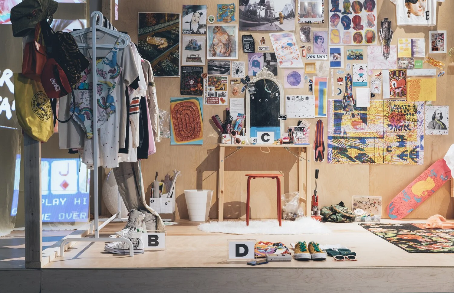 The imagery on the walls and the items scattered around the room, helped shine light on the personas of each teen.