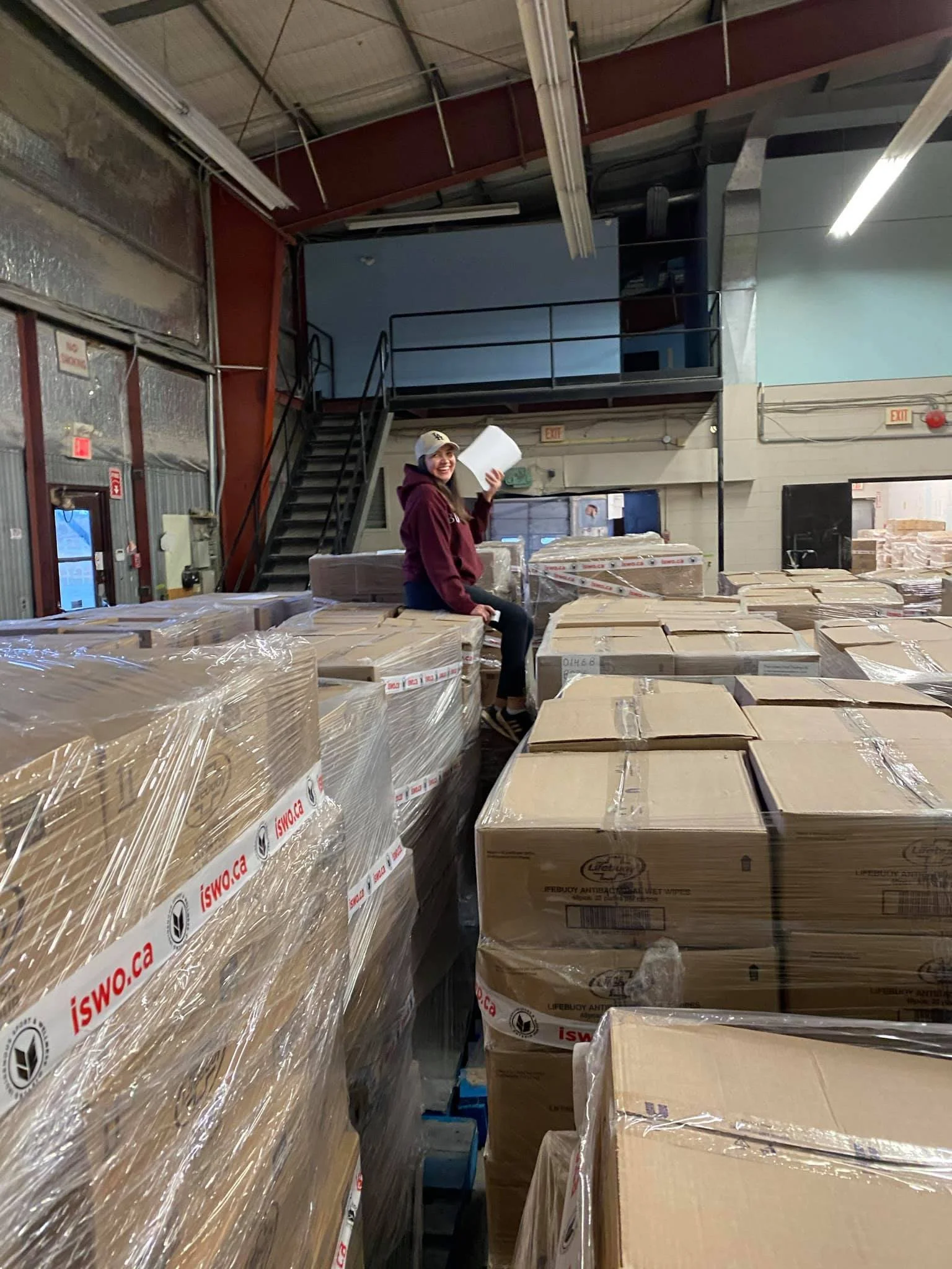 Semple Enterprises Inc. staff smiling in warehouse