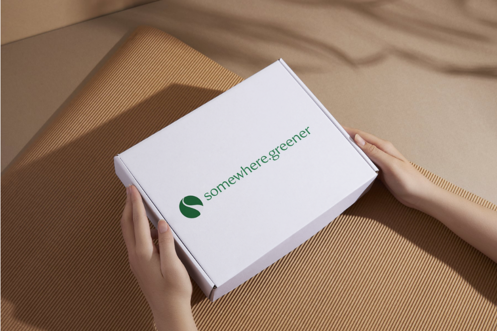 A white box with the somewhere.greener logo on the top