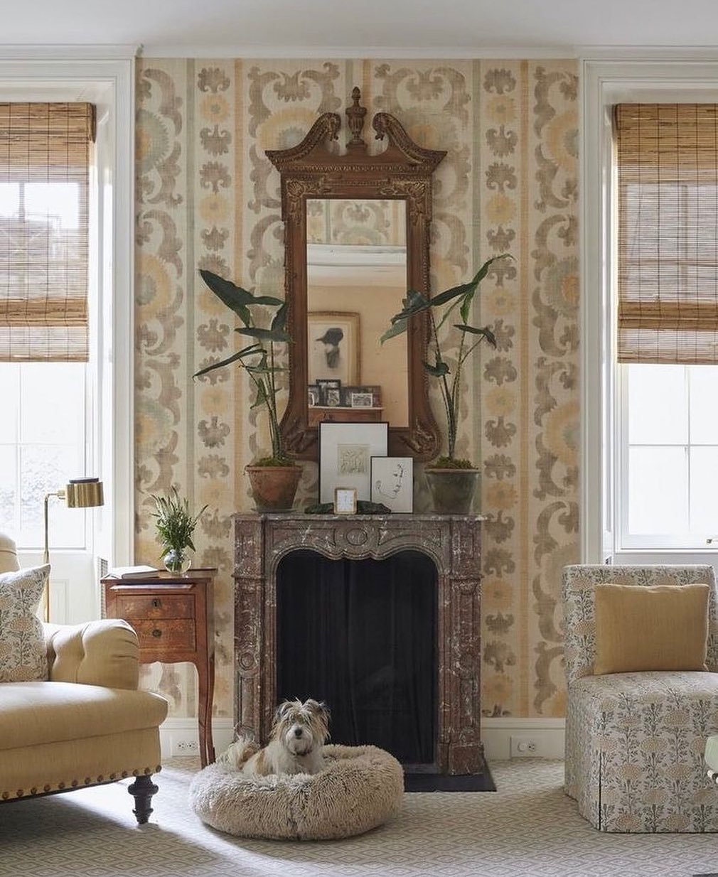 Autumnal hues, sophisticated pattern, and collected antiques create an irresistible warmth in this gathering space by @tomscheerer