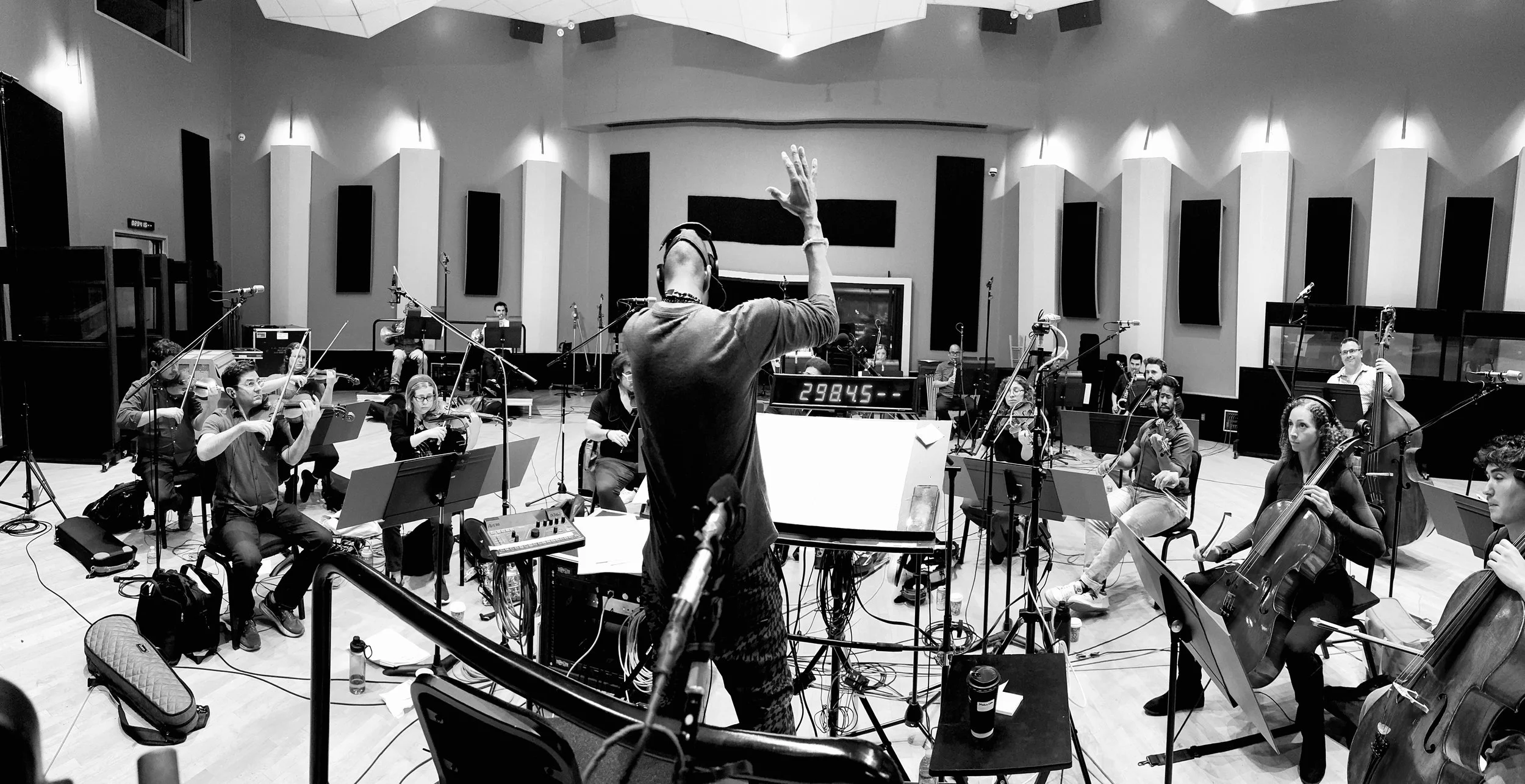 Music arranger and producer Rob Lewis conducting musicians in Evergreen Studios for Christina Aguilera's Christmas album "Christmas In Paris", 2025.