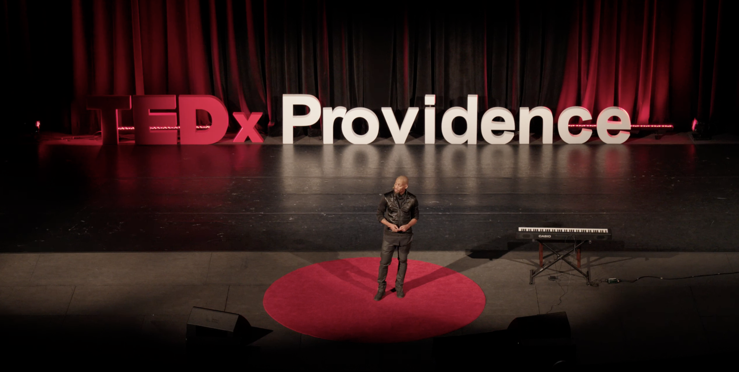 Rob Lewis delivering his TEDx Providence talk on creativity, ethics, and artificial intelligence.