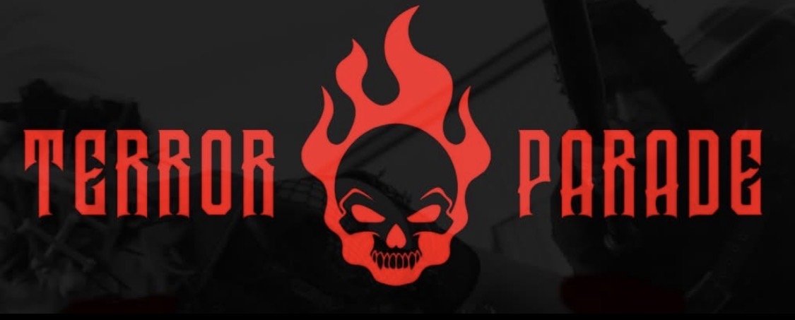 Logo for TERROR PARADE featuring a red flaming skull with angry eyes between the words 'TERROR' and 'PARADE' in red stylized font.