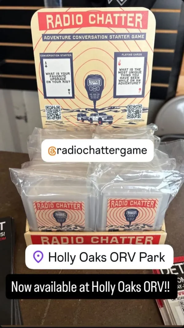 image of a POP display on a table holding Radio Chatter playing cards