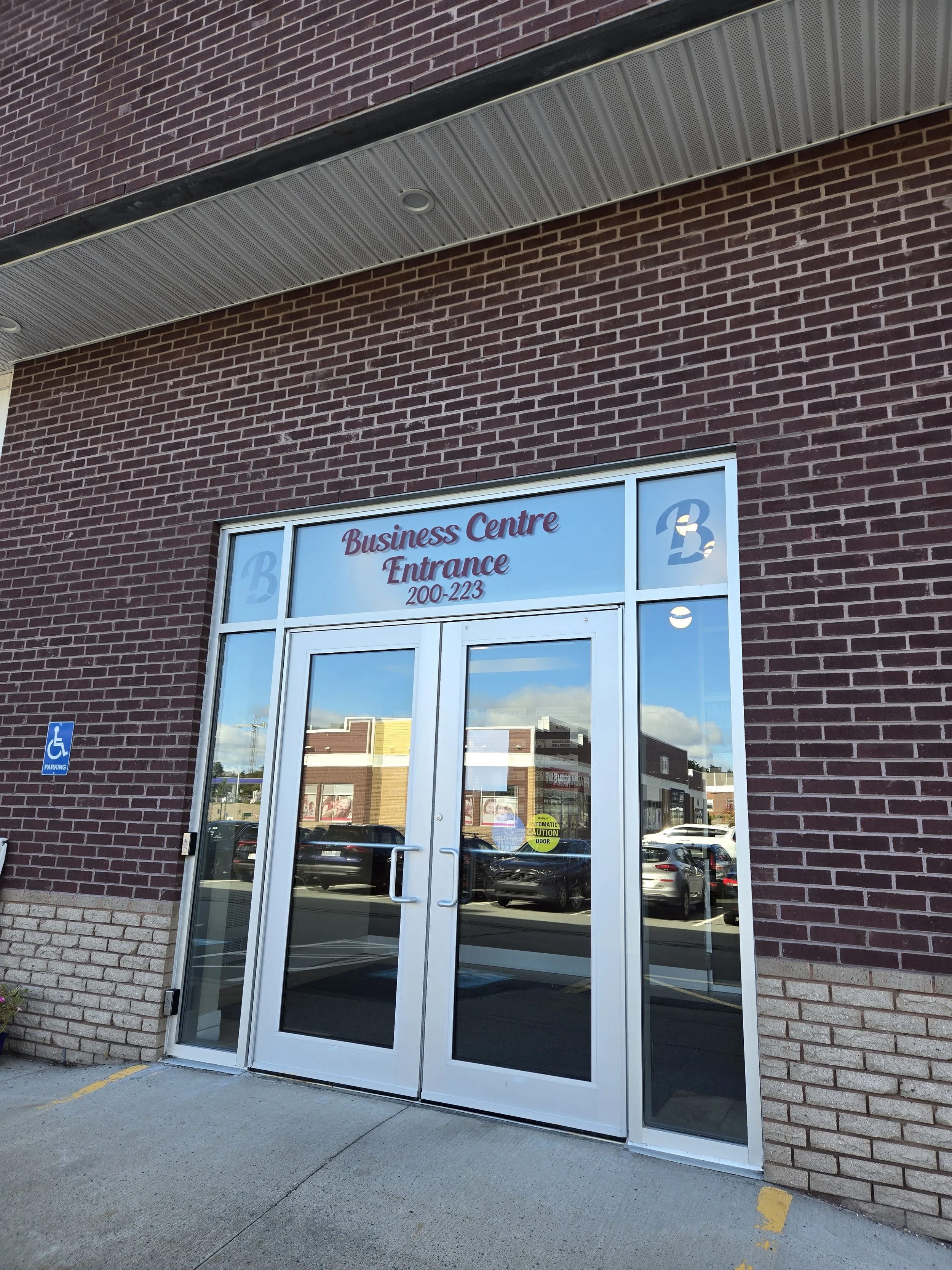 The entrance to a business center where Steady Mind Counselling operates to serve clients looking for quality therapy in Bedford