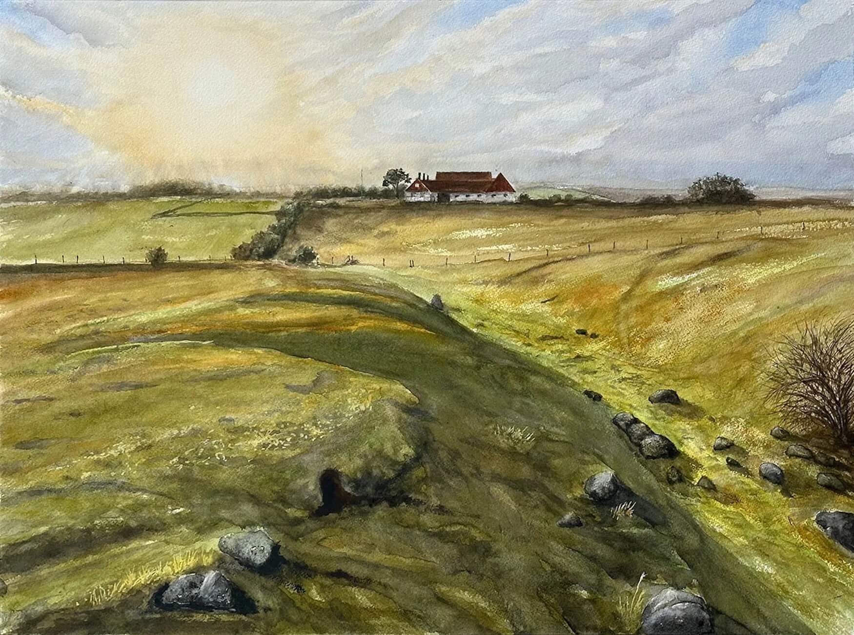 Watercolor painting of a rural landscape with rolling green and brown hills, a dirt path, a small stream, and a house with a red roof in the distance under a partly cloudy sky.