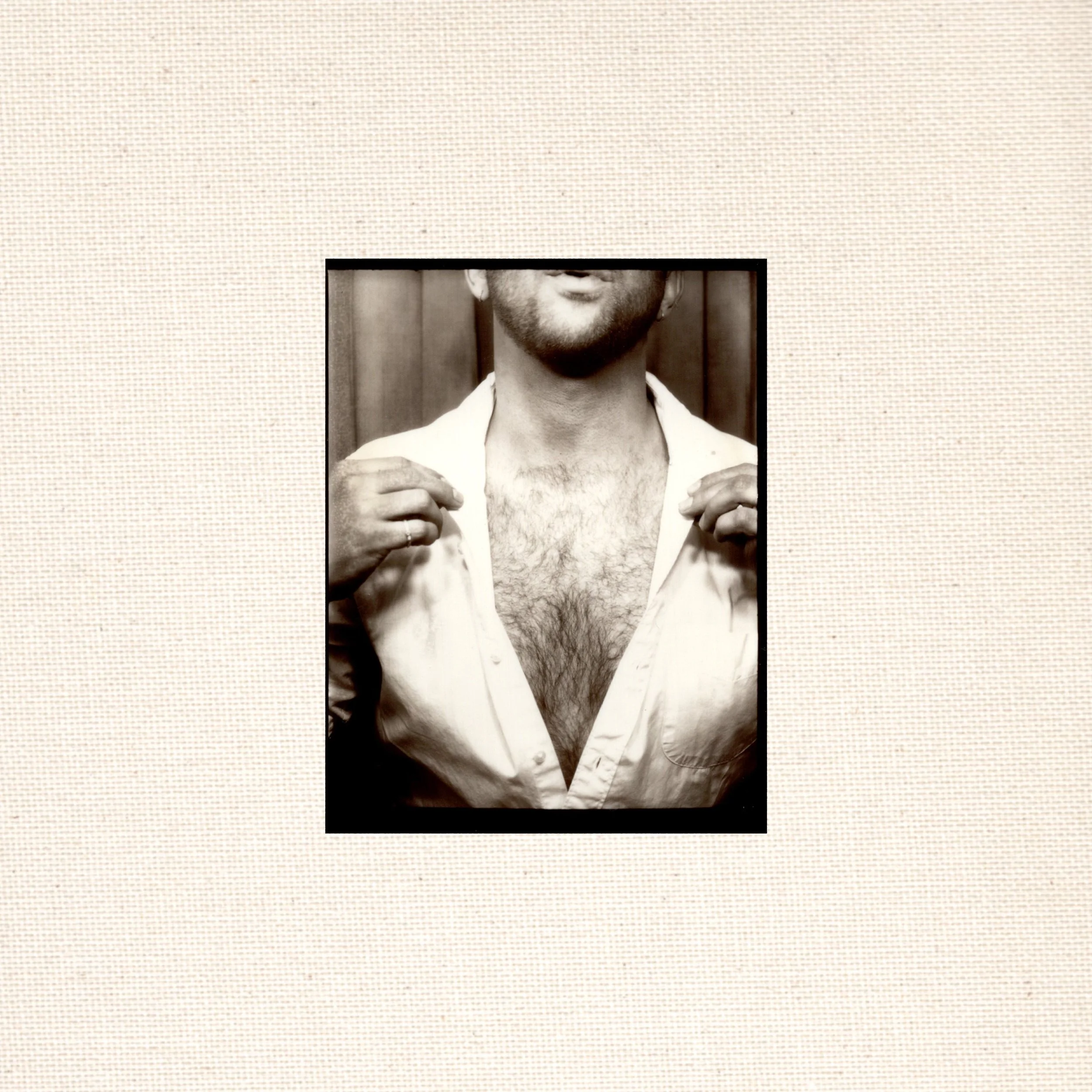 Half-Dressed Radio Episode 01 cover art featuring host Luke A. Wright buttoning his shirt in a sepia Photo Booth strip, placed on the back of a book. Podcast artwork for eclectic music, disco, jazz, soul, R&B, rock, electronic, and ambient shows.