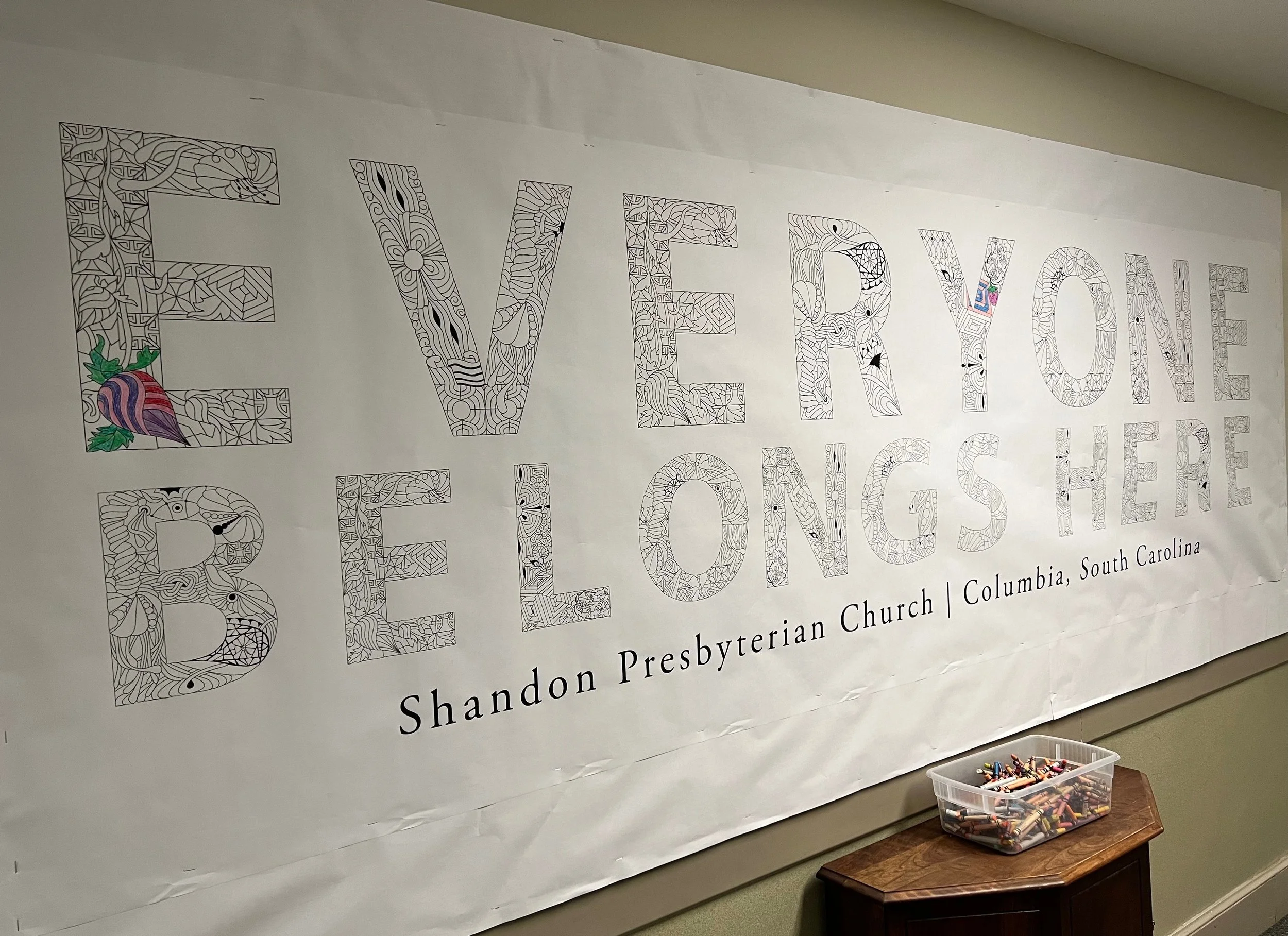 Hallway banner that reads, "Everyone belongs here."