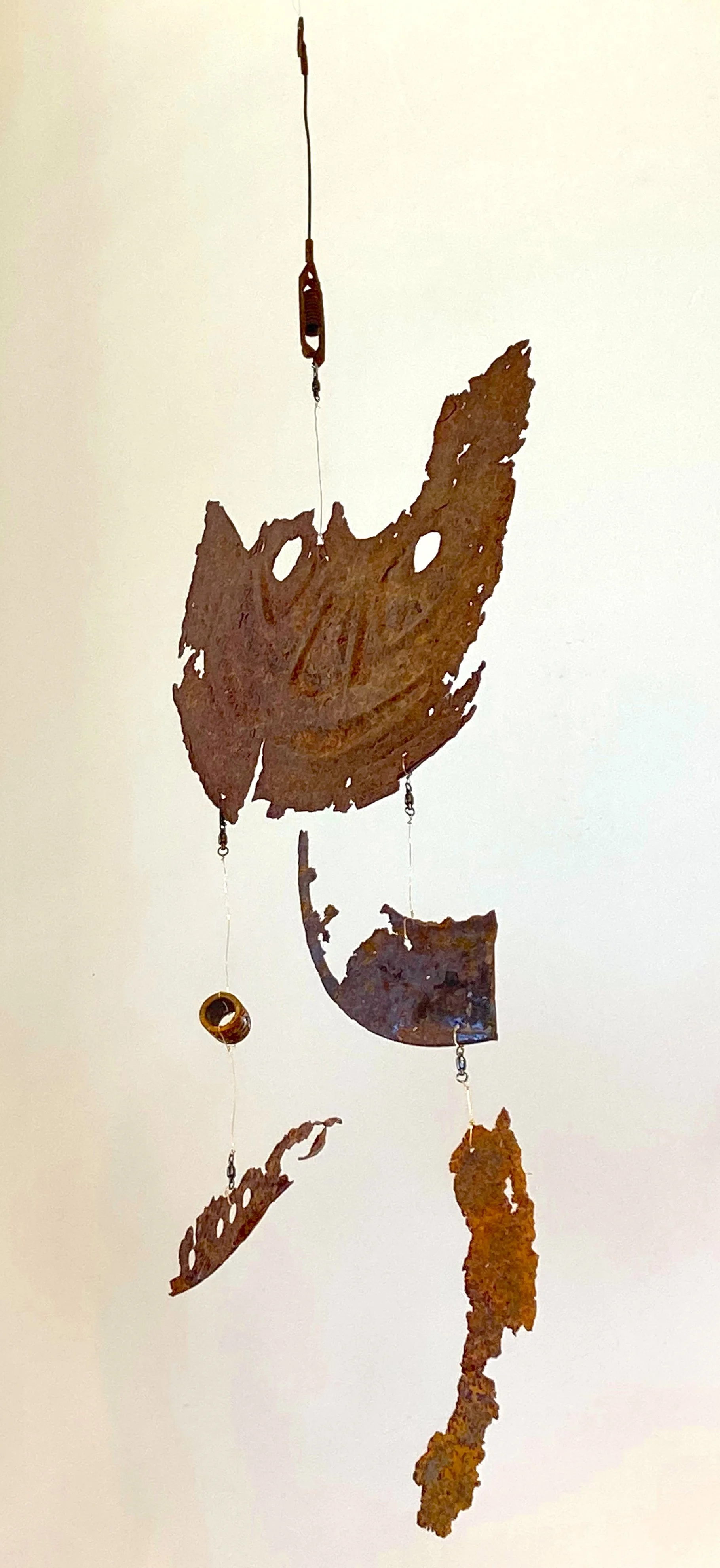 Grin & Bear It,  25"x11"x7” Found metal: car parts