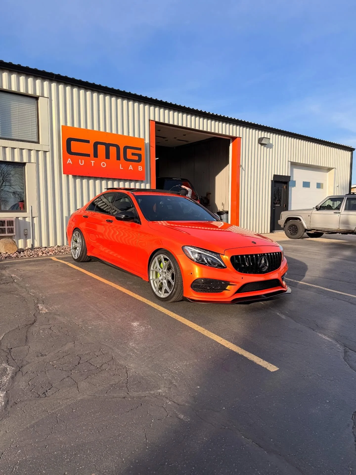 @mercedesamg C43 AMG fully Protected and customized using @tinybotppf Sunset Orange 🌅🍊 - Combining Stunning Visuals and Protection from Swirls, rock chips, road damage and anything the environment throws it this vehicle. Tinybot Colored PPF is read