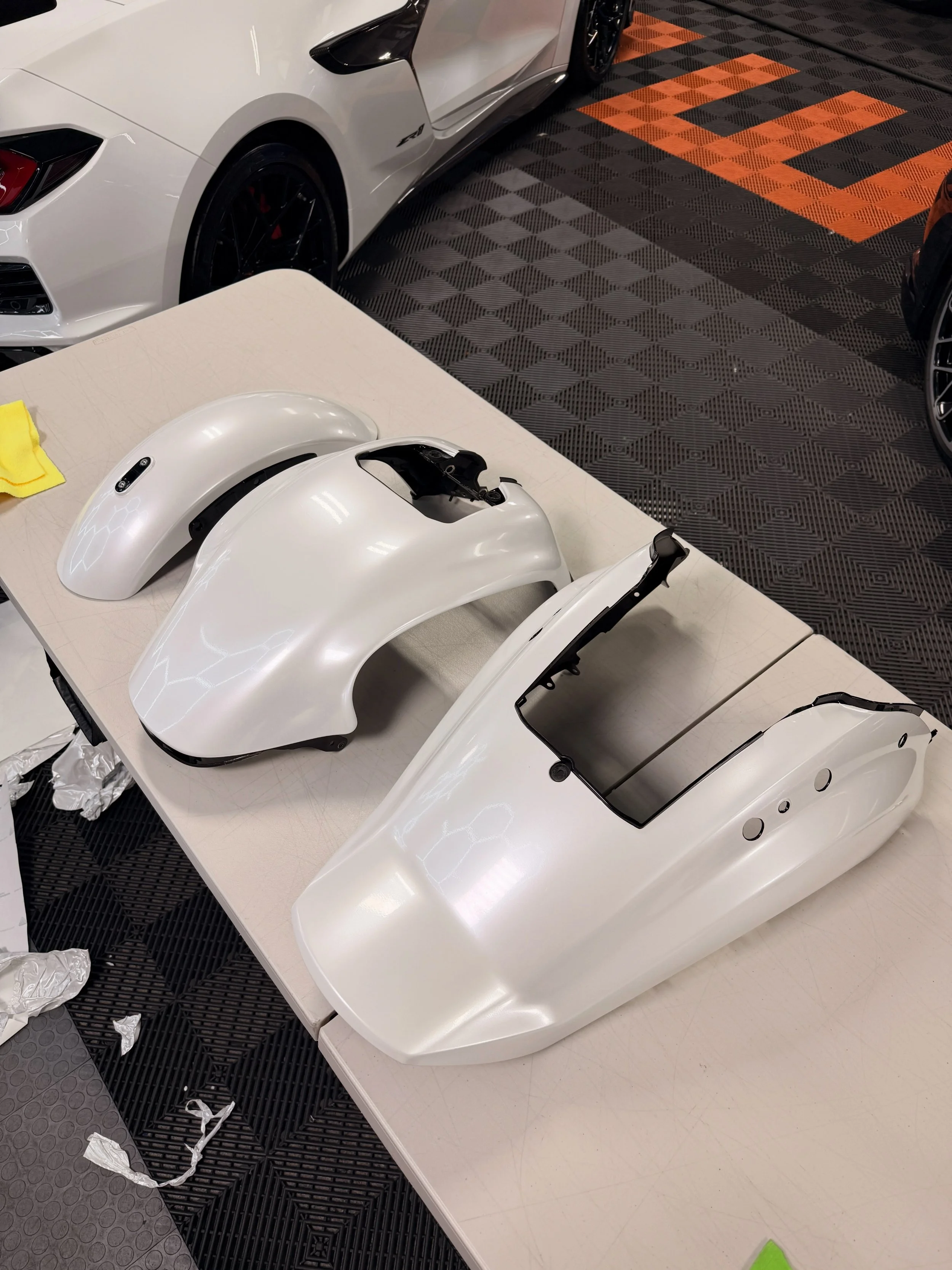 Harley Parts all wrapped up in Avery Dennison Gloss Pearl White Snow - CF Designs WI can take care of all your Vehicle - Commercial - Motorcycle vinyl needs!