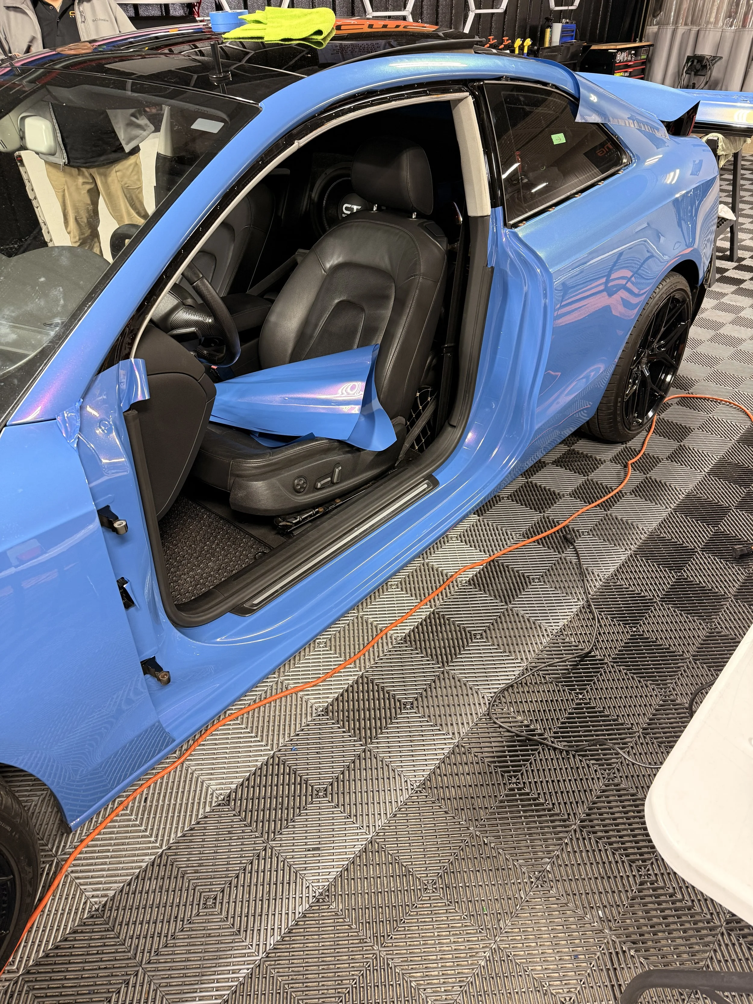 Audi A5 wrapped in Evolv Yaas Marina Metallic Color Paint Protection FIlm - Wrapping the full door jams that way there is 0 trace of the stock Gloss Black body color when opening the vehicle's doors.