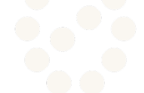 Multiple white pills arranged in a circular pattern on a black background.