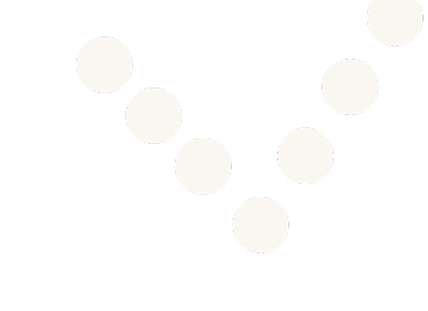 White circular beads arranged in a V shape on a black background.